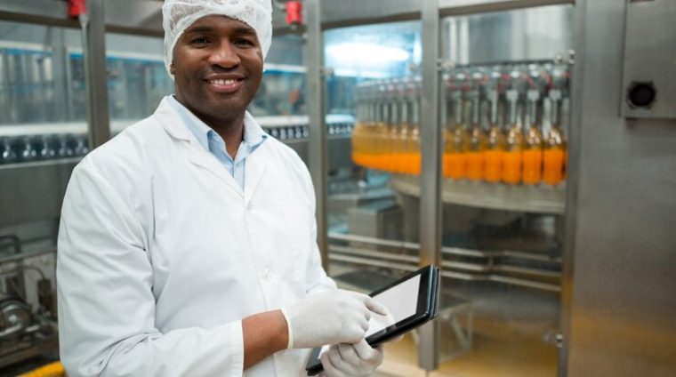 portrait-male-worker-holding-digital-tablet-factory_107420-96517