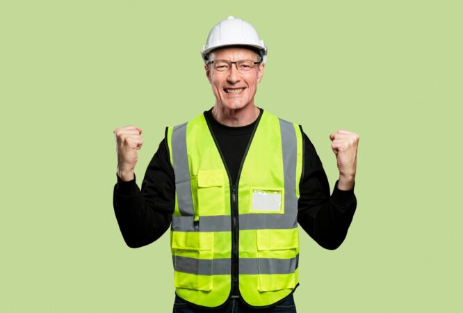 cheerful-male-engineer-reflective-vest-hard-hat_53876-105206