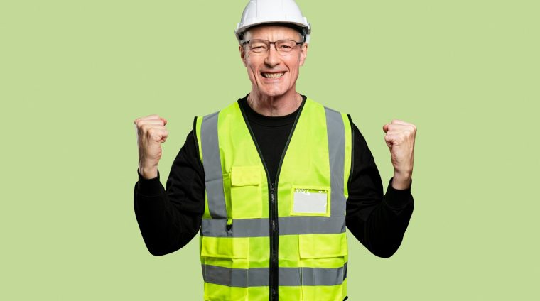 cheerful-male-engineer-reflective-vest-hard-hat_53876-105206