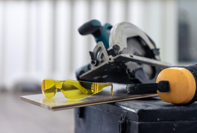 close-up-construction-safety-goggles-work-tools_169016-17031