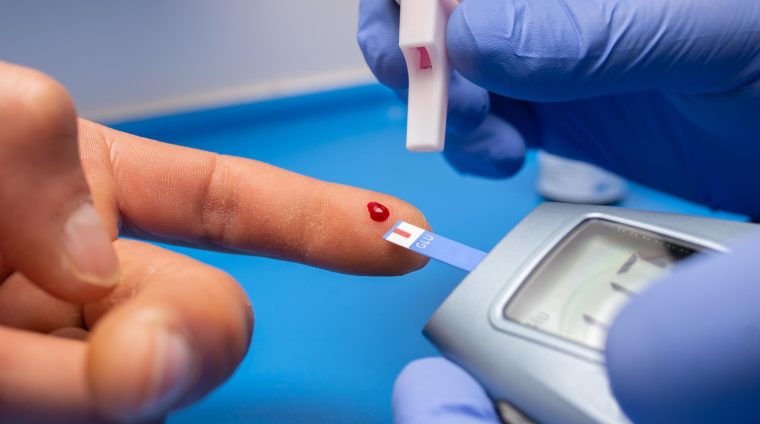 closeup-shot-doctor-with-rubber-gloves-taking-blood-test-from-patient_181624-56107