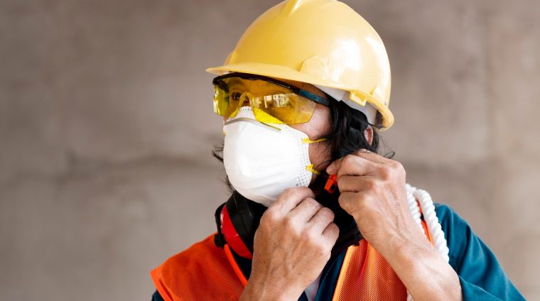 portrait-employee-with-safety-equipment_23-2148908459