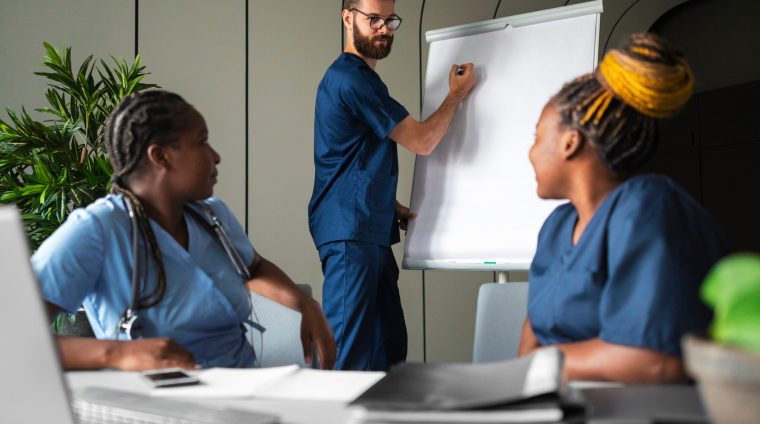 side-view-nurses-studying-together_23-2149741262